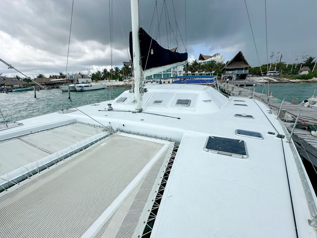 Bow of the Noe Island catamaran in Cancun set up for a large group charter