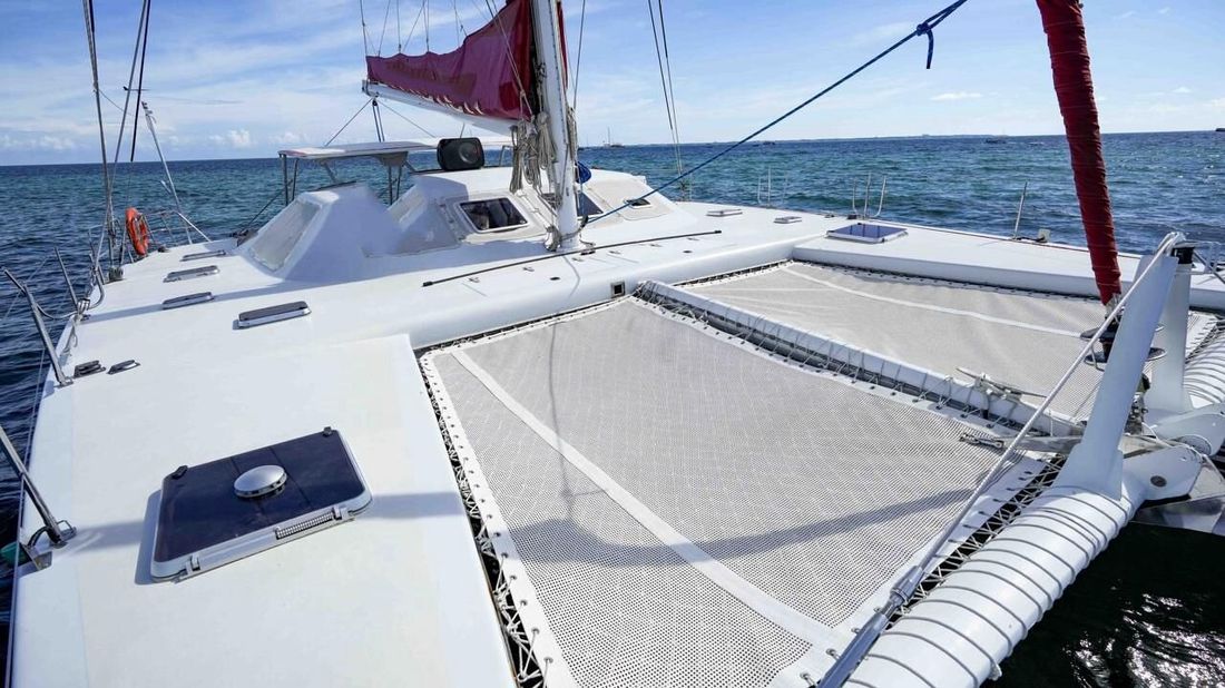 Two-deck events catamaran in Cancun set up for a 250-guest private party