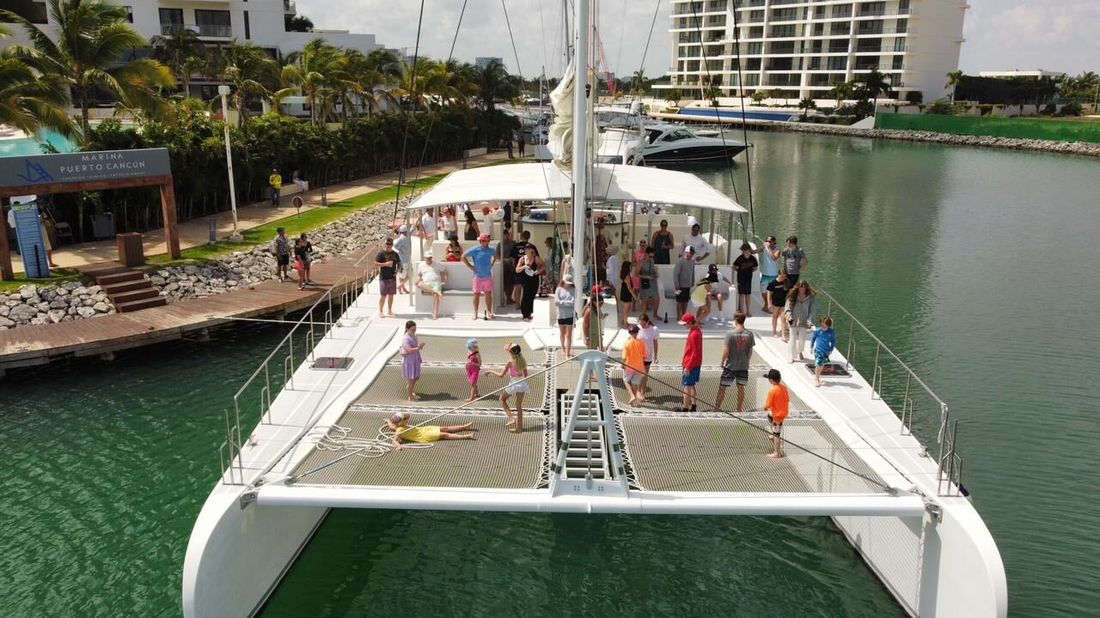 The Imperial 68, the biggest sailing catamaran in Cancun, at the marina