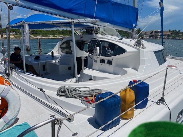 Aerial view of the Amarys 38 catamaran cruising from Cancun to Isla Mujeres